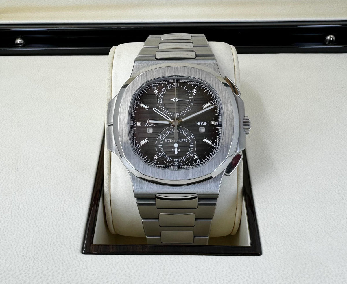 Patek Philippe 40.5mm Nautilus Travel Time Chronograph Watch Black Dial 5990/1A